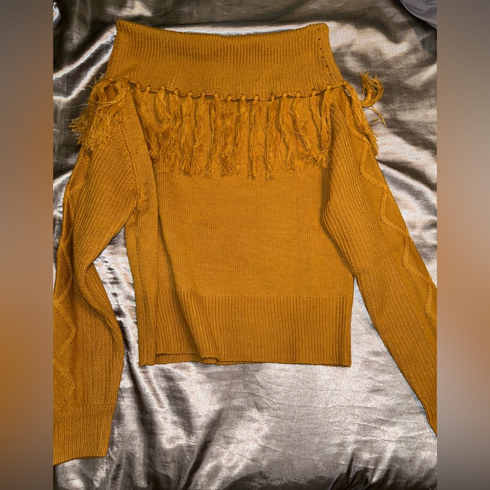 Small boutique sweater